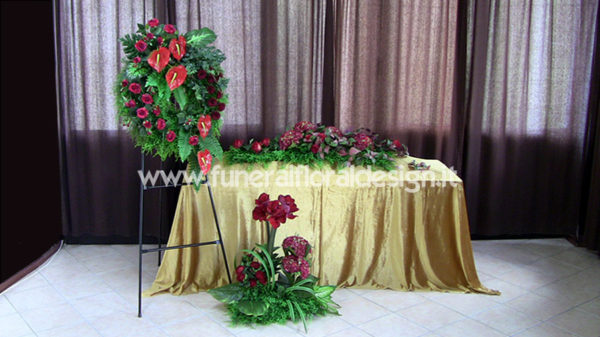 Addobbo funerario fiori artificiali rossi onoranze funebri